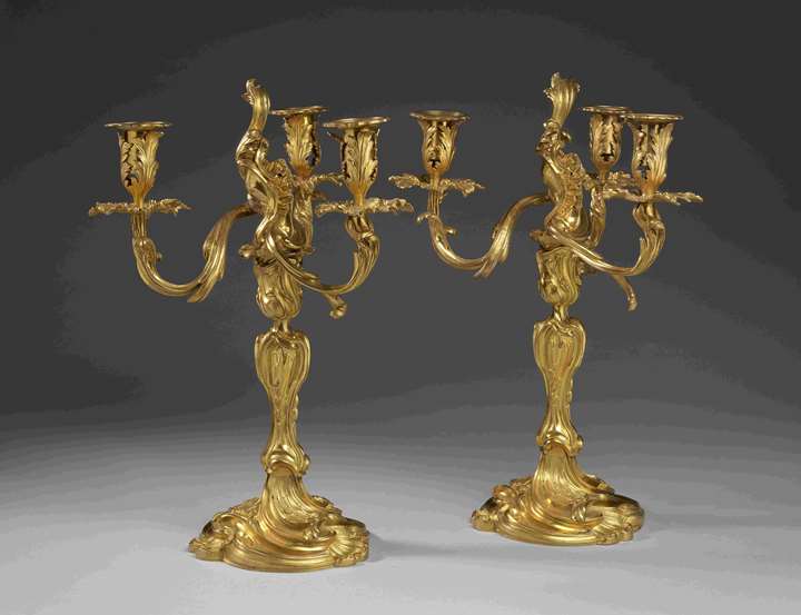 A pair of gilt bronze three branch candelabra (girandoles)